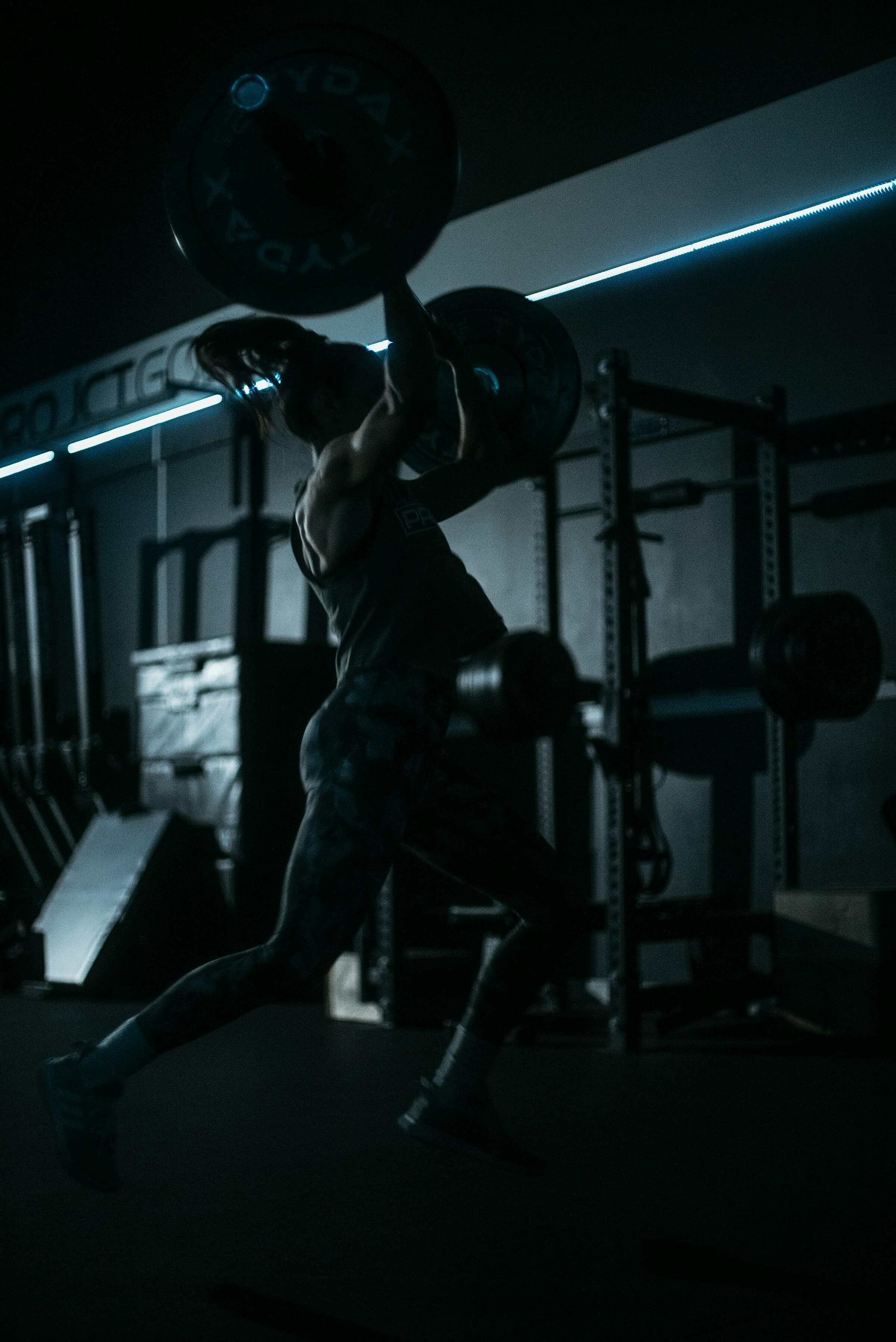 Athlete gripping barbell